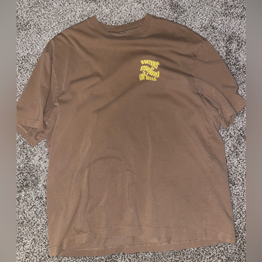 Tan “never ending cities” tee